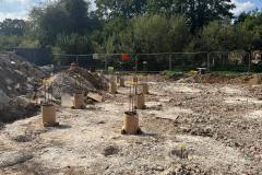 Reinforced concrete foundation slab preparation following piling and ground beam installation in Hertfordshire