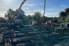 Reinforcement preparation and pile trimming works during residential foundation construction in Hertfordshire